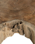 Koro serving board in teak featuring natural edge detail and rich organic wood grain.