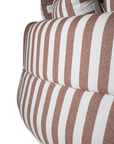 Laguna modular sofa in cinnabar stripe fabric with curved form and soft cushions on a clean background.