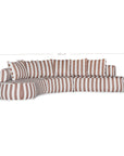 Laguna modular sofa in cinnabar stripe fabric with curved form and soft cushions on a clean background.
