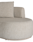 Laguna modular sofa in oat drift fabric with curved form and soft cushions on a clean background.