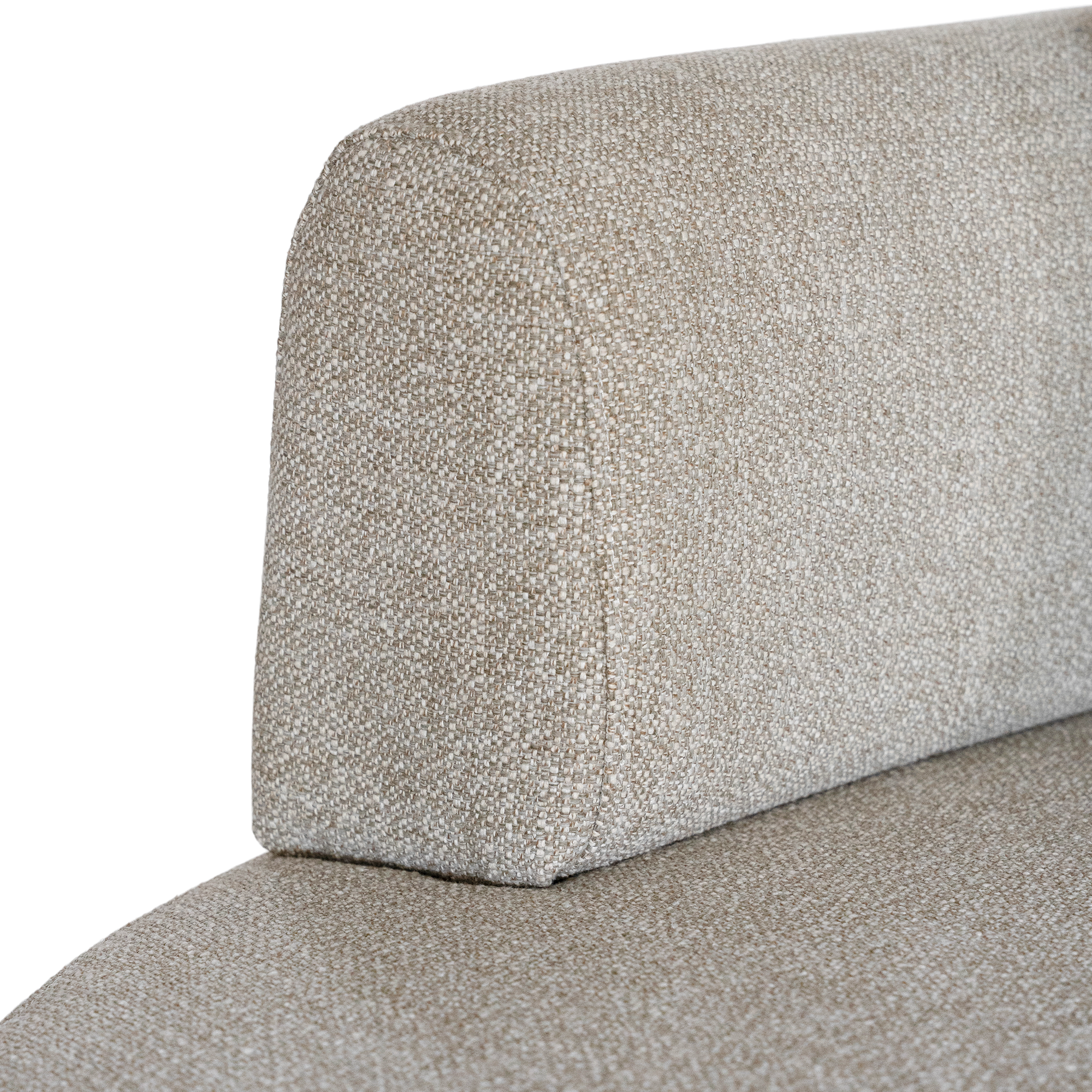 Laguna modular sofa in oat drift fabric with curved form and soft cushions on a clean background.