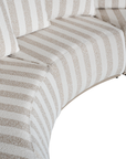 Laguna modular sofa in sand stripe fabric with curved form and soft cushions on a clean background.