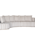 Laguna modular sofa in sand stripe fabric with curved form and soft cushions on a clean background.