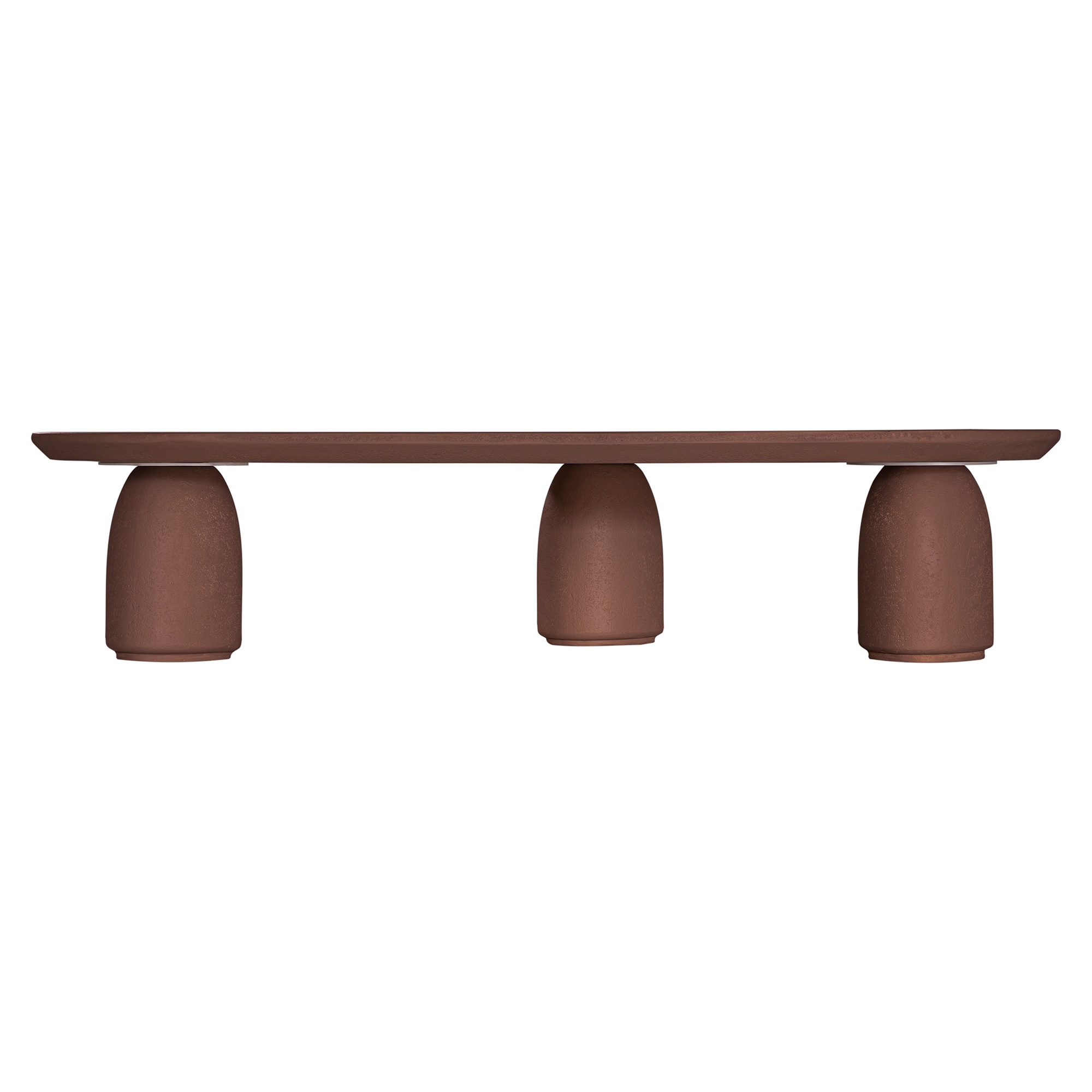 Lantara coffee table in cinnabar clay finish with elongated oval top and three rounded sculptural legs.
