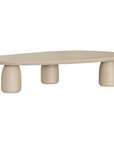 Lantara coffee table in driftstone finish with sculptural pedestal base and soft rounded top.