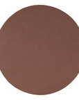 Lantara coffee table in cinnabar clay finish with rounded top and three rounded sculptural legs.