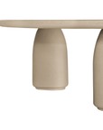 Lantara coffee table in driftstone finish with sculptural pedestal base and soft rounded top.