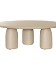 Lantara coffee table in driftstone finish with sculptural pedestal base and soft rounded top.