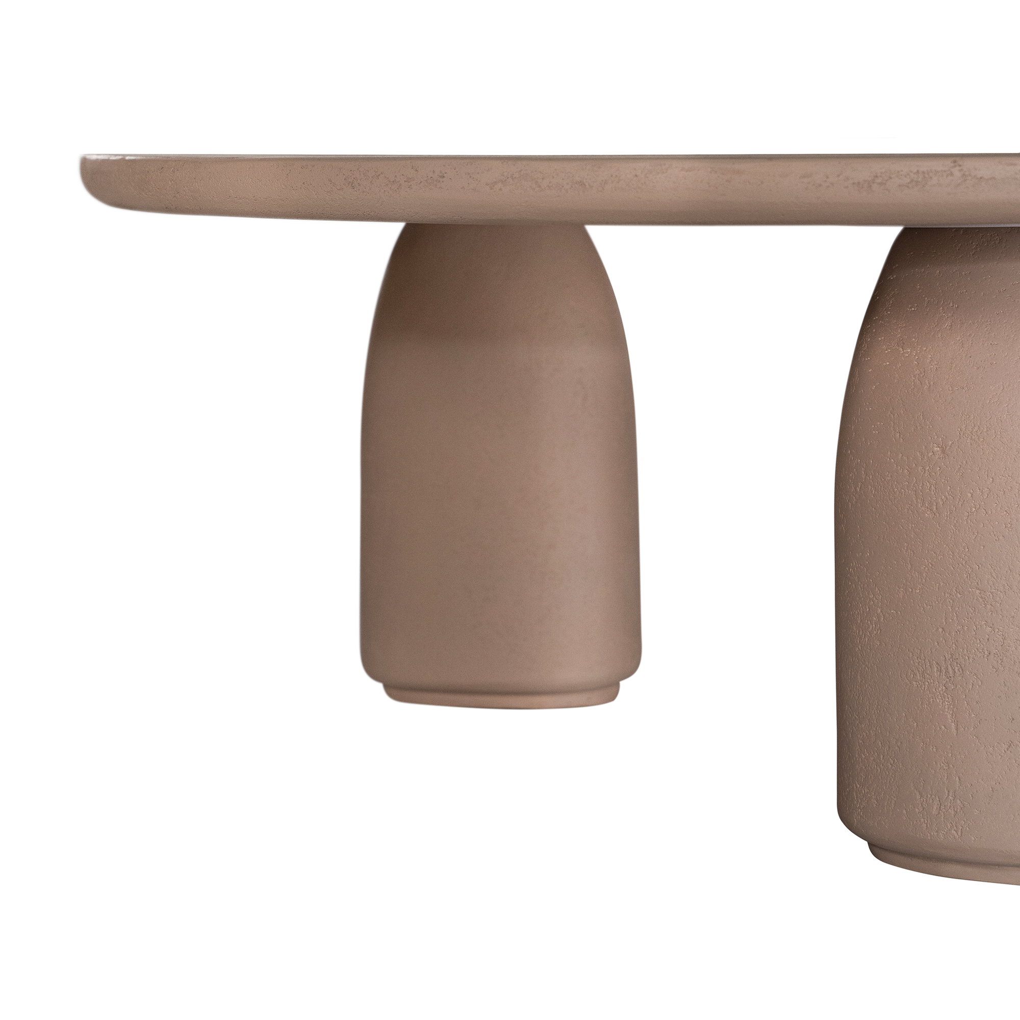 Lantara coffee table small in nomad dune finish with rounded top and three sculptural cylindrical legs.