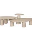 Lantara table cluster in driftstone finish with sculptural pedestal base and soft rounded top.