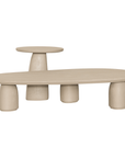 Lantara table cluster in driftstone finish with sculptural pedestal base and soft rounded top.