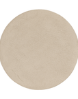 Lantara side table in driftstone finish with sculptural pedestal base and soft rounded top.