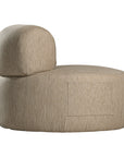 A contemporary latte upholstered lounge chair with a low-profile design and curved backrest. This modern, armless seating piece features a smooth, rounded silhouette, making it a stylish and comfortable addition to any living space