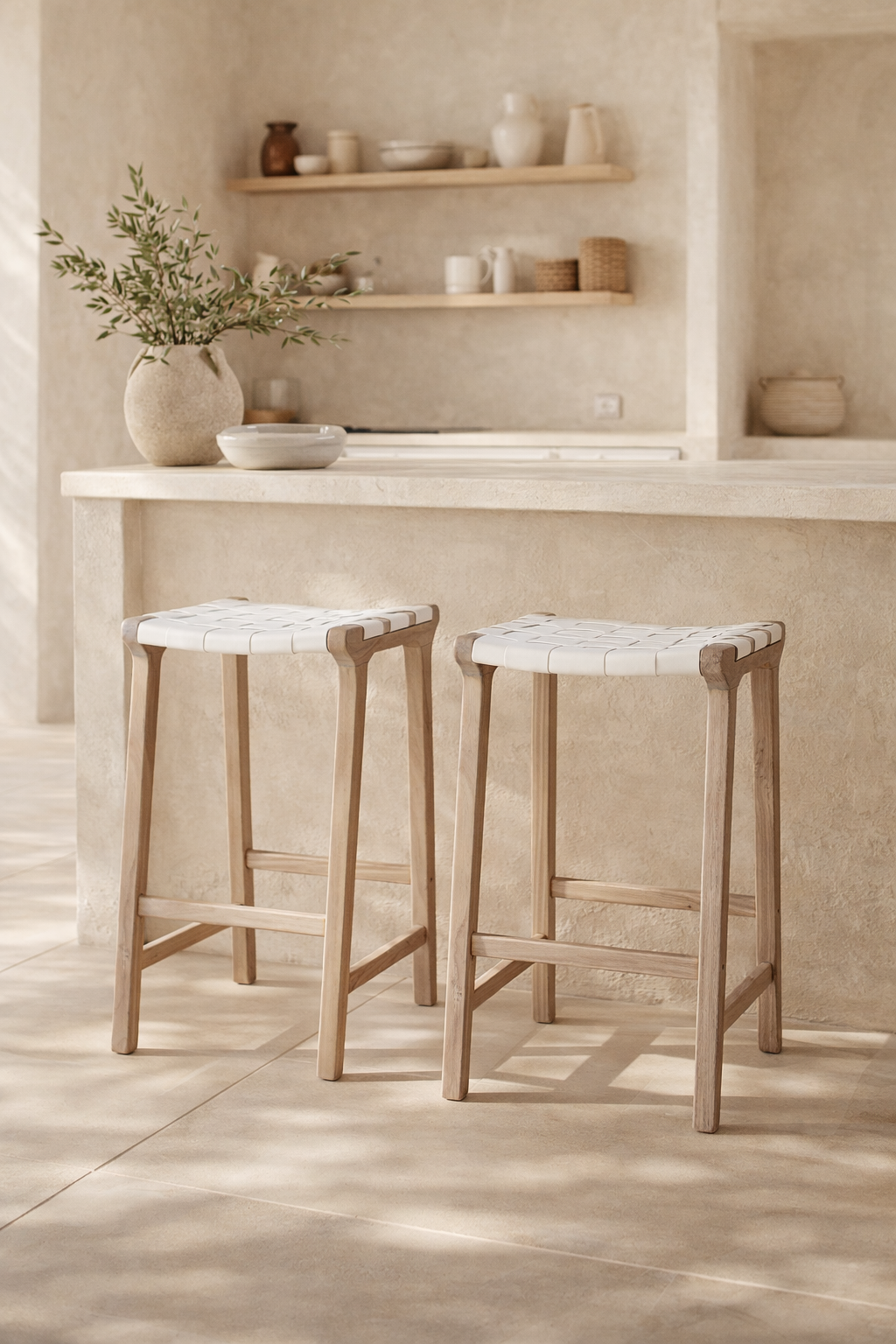 Lazzy barstool in natural timber with white woven seat styled at a mediterranean inspired kitchen island with soft neutral textures
