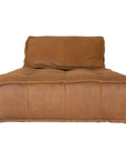 A stylish leather modular sofa with a low-profile design and plush cushioning, offering a relaxed and contemporary seating option for modern interiors