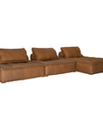 A stylish leather modular sofa with a low-profile design and plush cushioning, offering a relaxed and contemporary seating option for modern interiors