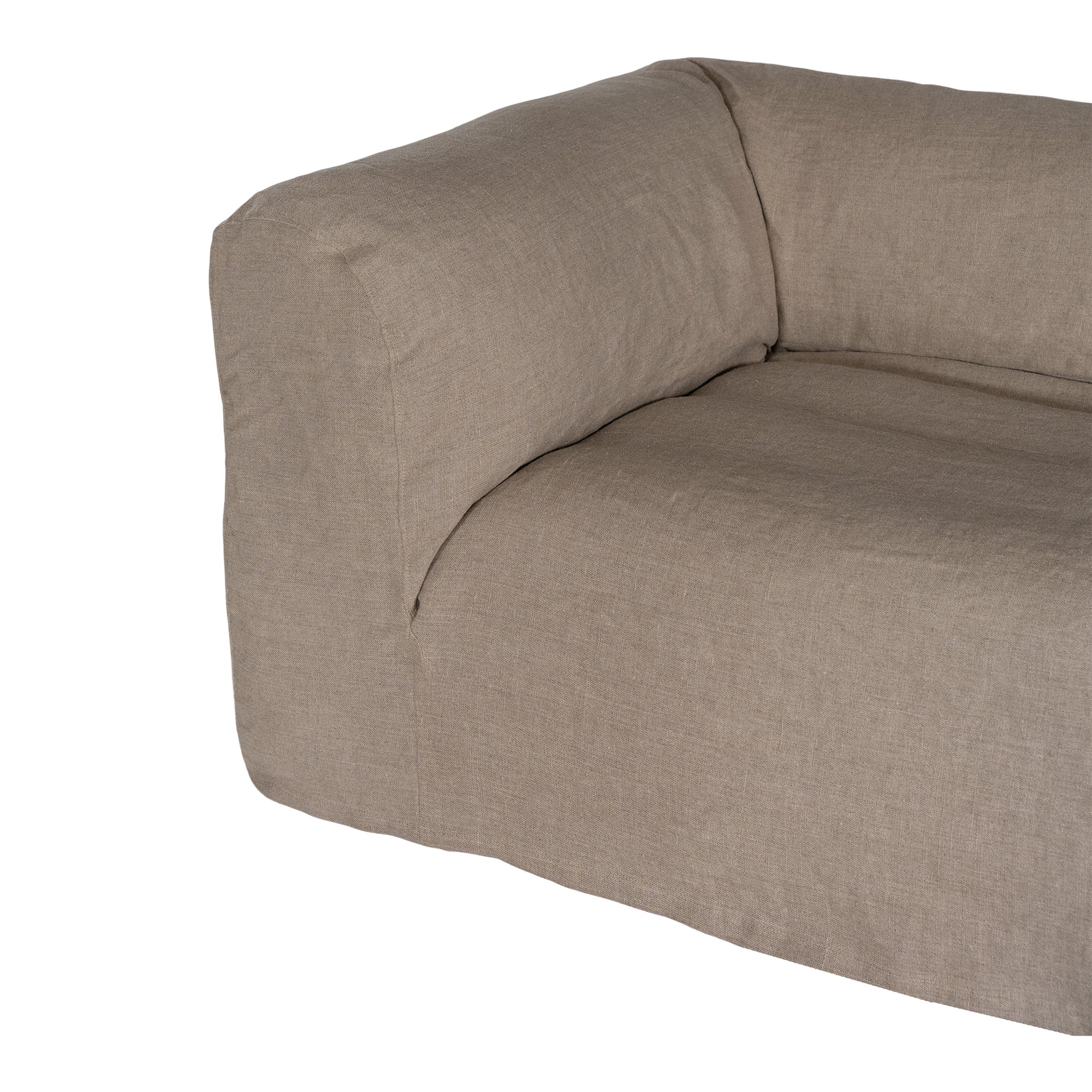 Natural linen modular sofa with plush upholstery, offering a relaxed and comfortable seating option for modern living spaces