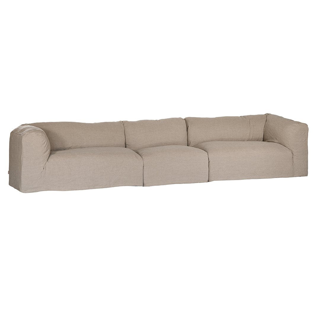 Natural linen modular sofa with plush upholstery, offering a relaxed and comfortable seating option for modern living spaces