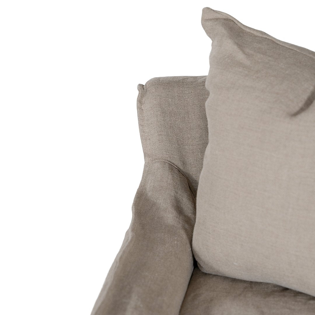 Natural linen one seater sofa with plush cushions, featuring a relaxed and stylish design for effortless comfort