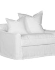 White linen one seater sofa with plush cushions, featuring a relaxed and stylish design for effortless comfort