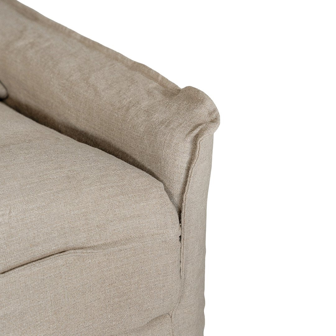 Natural linen three seater sofa with plush cushions, featuring a relaxed and stylish design for effortless comfort