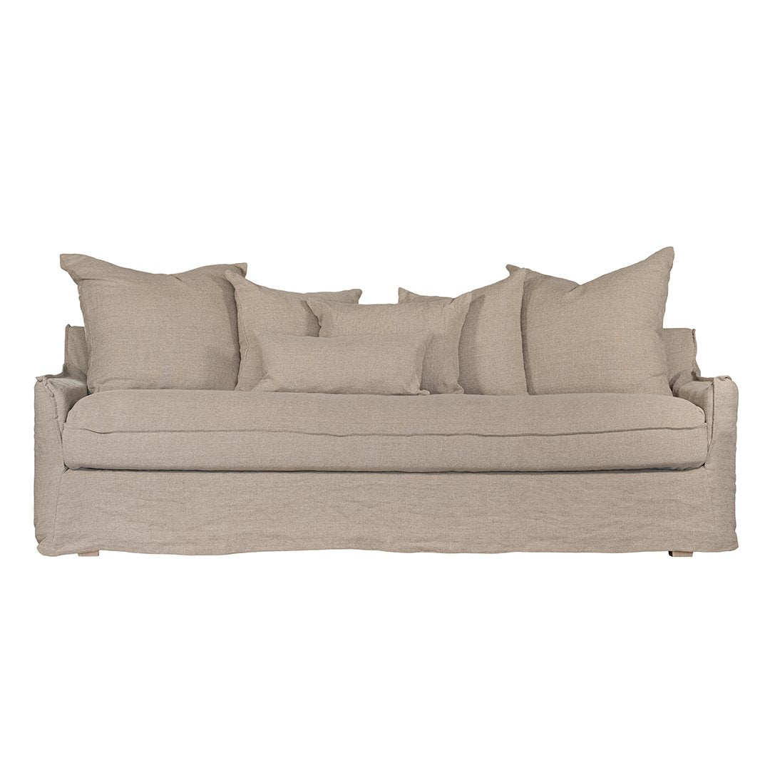 Natural linen three seater sofa with plush cushions, featuring a relaxed and stylish design for effortless comfort