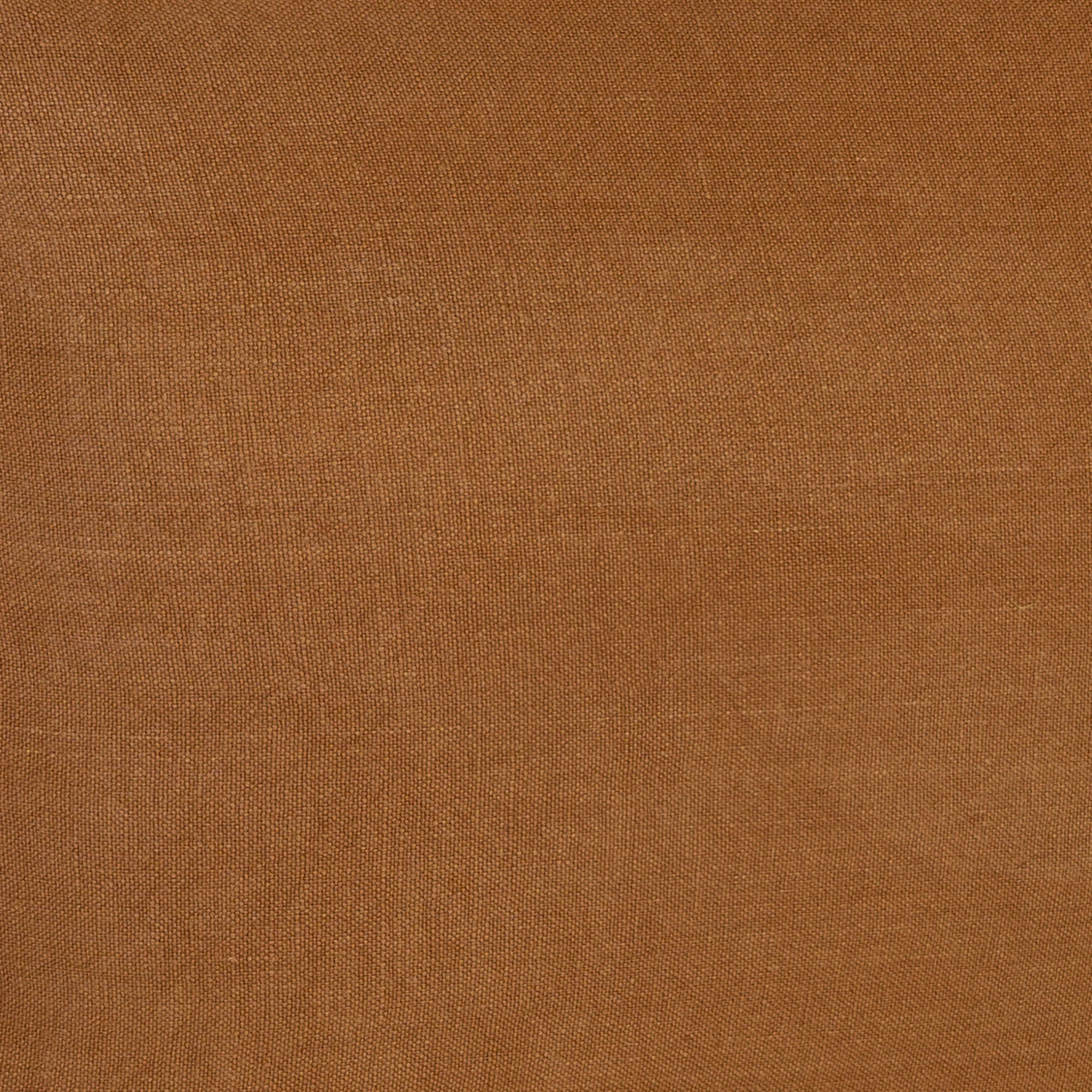A linen slipcover pouf with a soft, rounded silhouette. This versatile upholstered ottoman offers a relaxed, natural aesthetic, perfect for adding extra seating or a stylish accent to any space.
