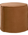 A linen slipcover pouf with a soft, rounded silhouette. This versatile upholstered ottoman offers a relaxed, natural aesthetic, perfect for adding extra seating or a stylish accent to any space.