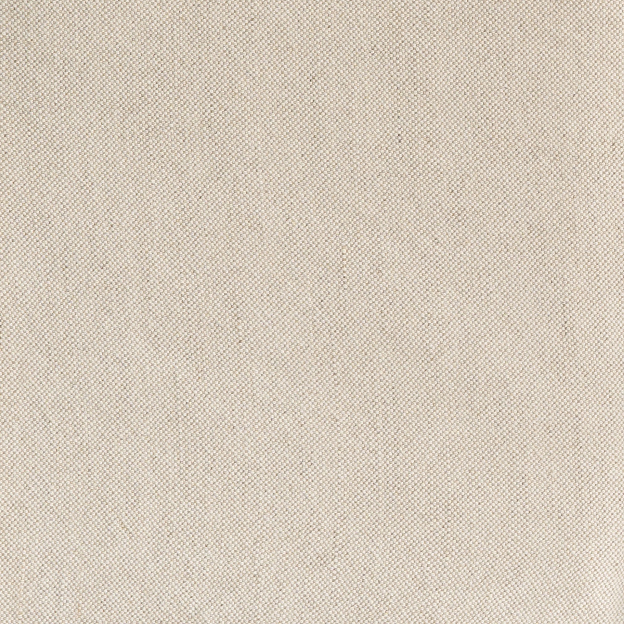 A linen slipcover pouf with a soft, rounded silhouette. This versatile upholstered ottoman offers a relaxed, natural aesthetic, perfect for adding extra seating or a stylish accent to any space.
