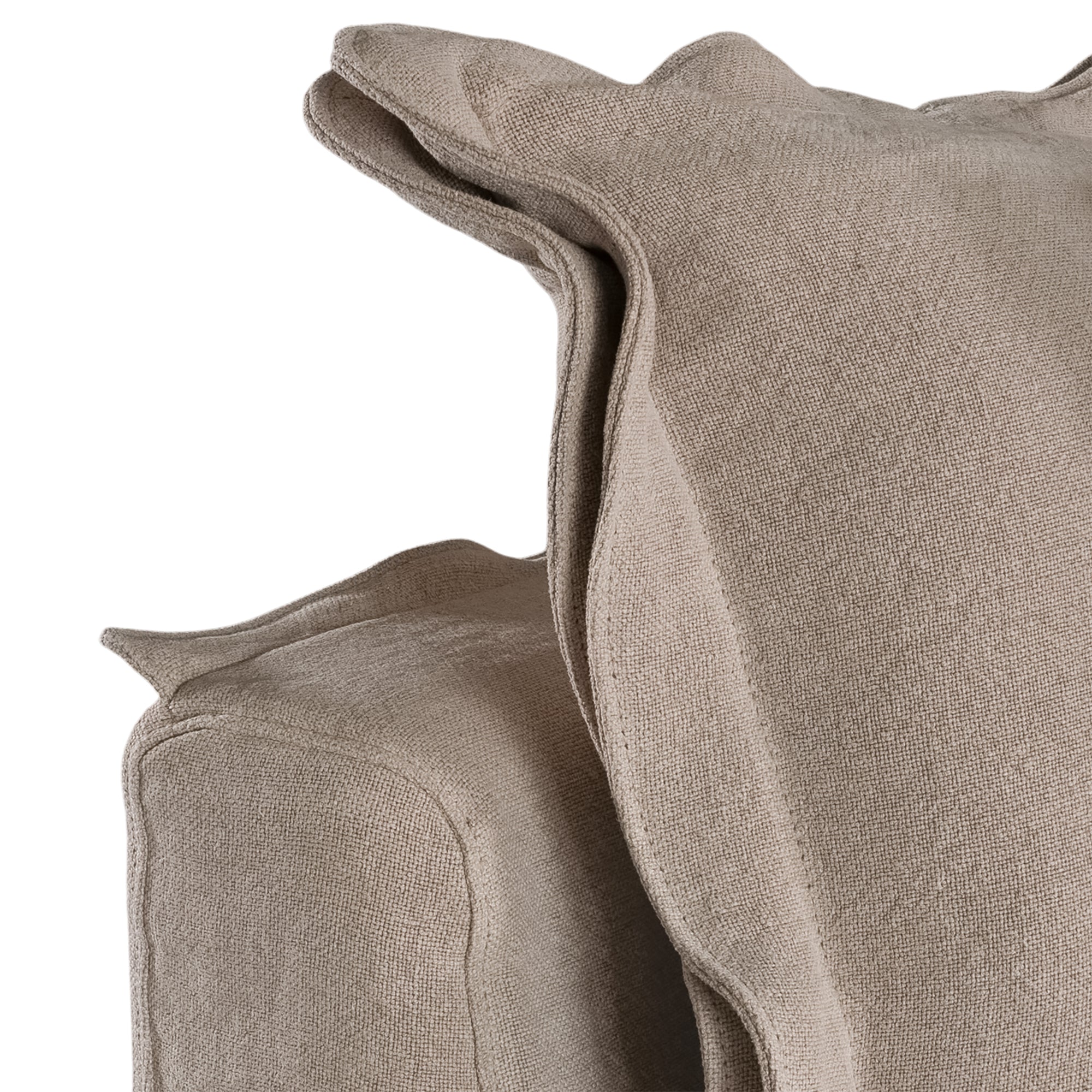 A plush linen slipcover ottoman in a warm taupe tone, featuring a relaxed silhouette with a soft cushion top. Perfect for versatile seating, a footrest, or as a stylish accent in contemporary and coastal-inspired interiors