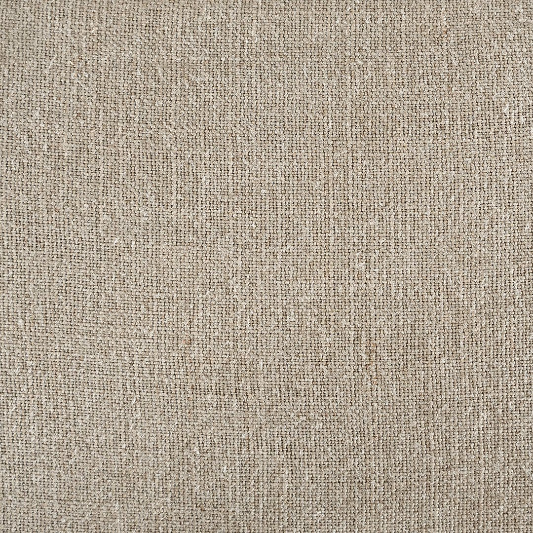 Linen slipcover sectional sofa, designed for effortless comfort and relaxed elegance. Features a modular design with plush cushions and a timeless neutral hue