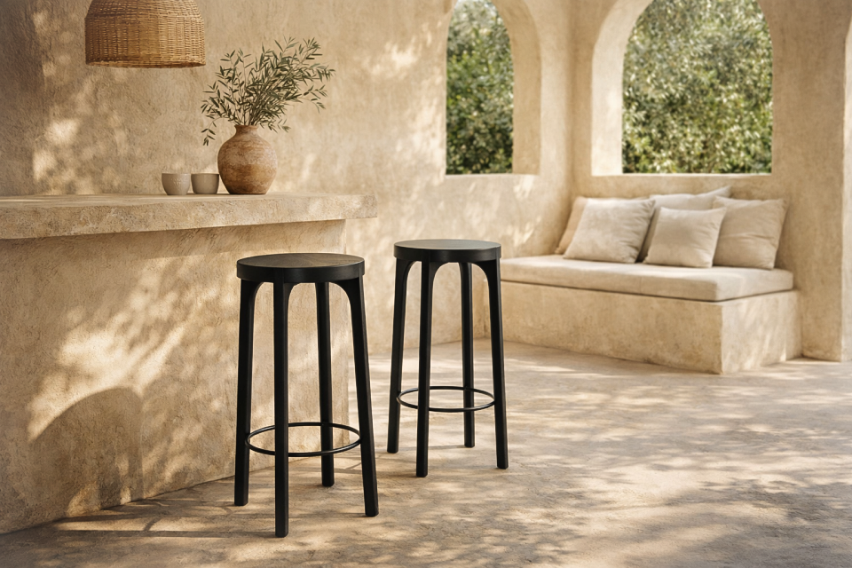 Lola back barchair in black timber styled at a rendered mediterranean verandah bar with arched windows and built in bench seating