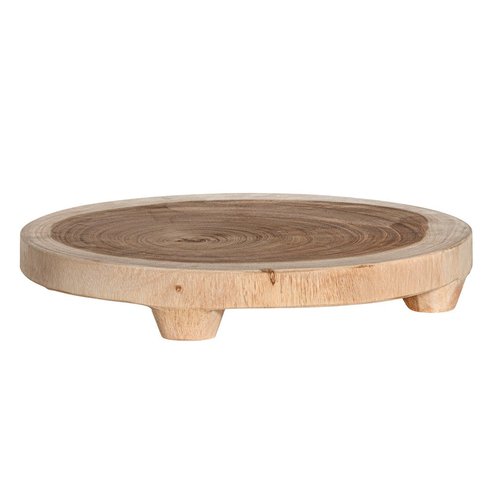 Lumara cheese plate in solid natural wood with round profile, visible timber grain and low pedestal feet.