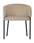 Lumo dining chair in bone with soft upholstered seat and curved backrest on slim black legs shown in a clean minimal setting.