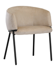Lumo dining chair in bone with soft upholstered seat and curved backrest on slim black legs shown in a clean minimal setting.