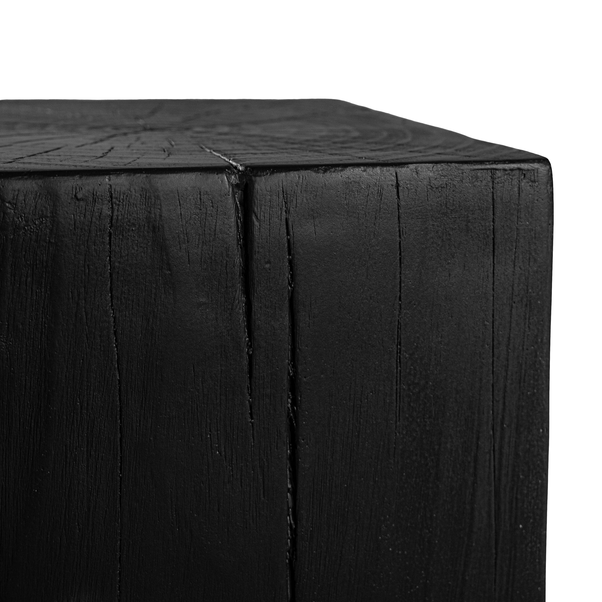Kulala Living solid magnesium oxide block side table, showcasing organic grain patterns and a minimalist cube design. A versatile and stylish furniture piece