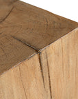 Kulala Living solid magnesium oxide block side table, showcasing organic grain patterns and a minimalist cube design. A versatile and stylish furniture piece