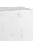 Kulala Living solid magnesium oxide block side table, showcasing organic grain patterns and a minimalist cube design. A versatile and stylish furniture piece
