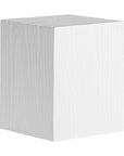 Kulala Living solid magnesium oxide block side table, showcasing organic grain patterns and a minimalist cube design. A versatile and stylish furniture piece