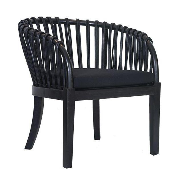 Makena chair in black rattan with a linen seat cushion, featuring a curved backrest and sturdy timber frame, perfect for a relaxed dining setting