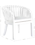 Makena chair in white rattan with a linen seat cushion, featuring a curved backrest and sturdy timber frame, perfect for a relaxed dining setting