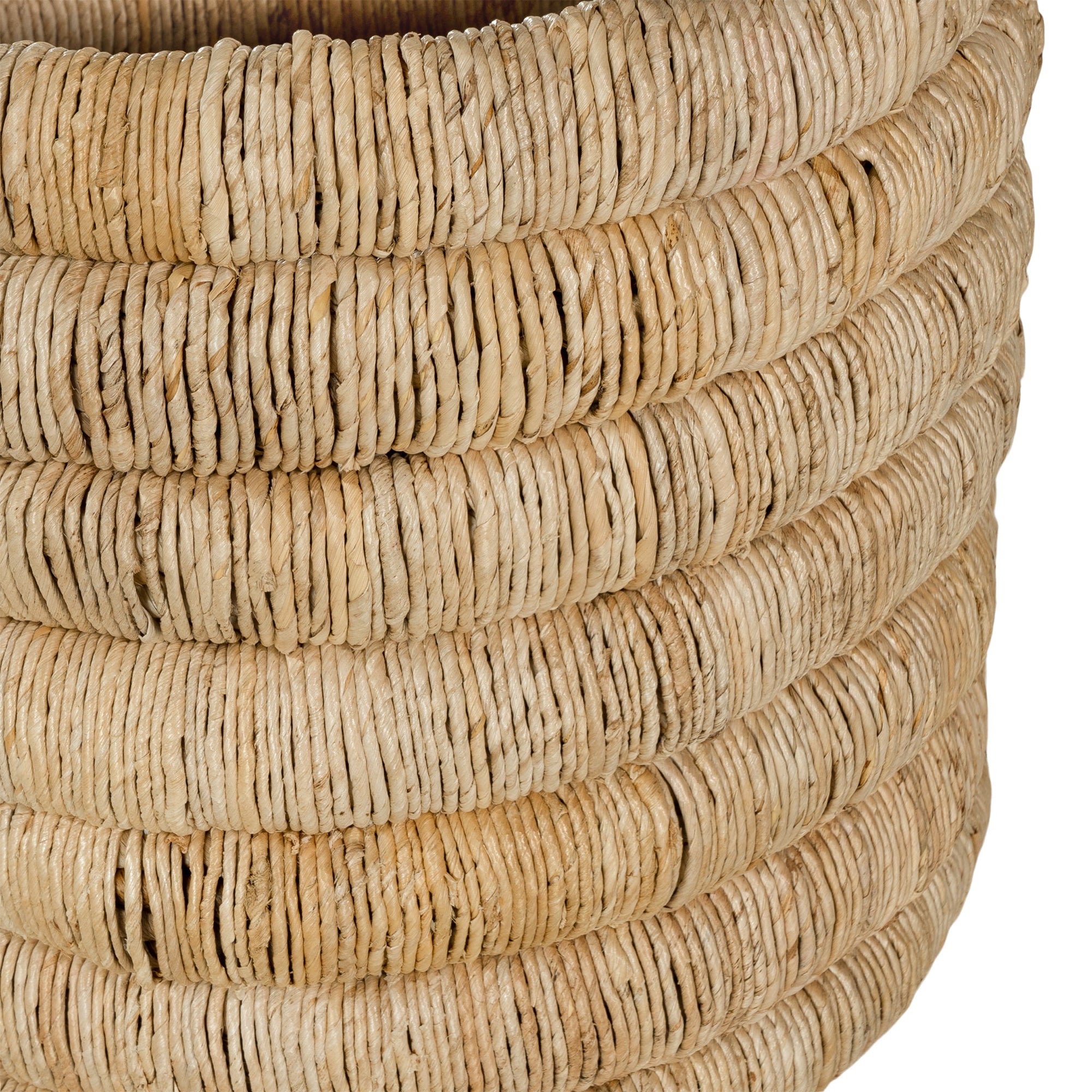 Mara natural handwoven storage basket with integrated handles in warm textured fibre set on a neutral background