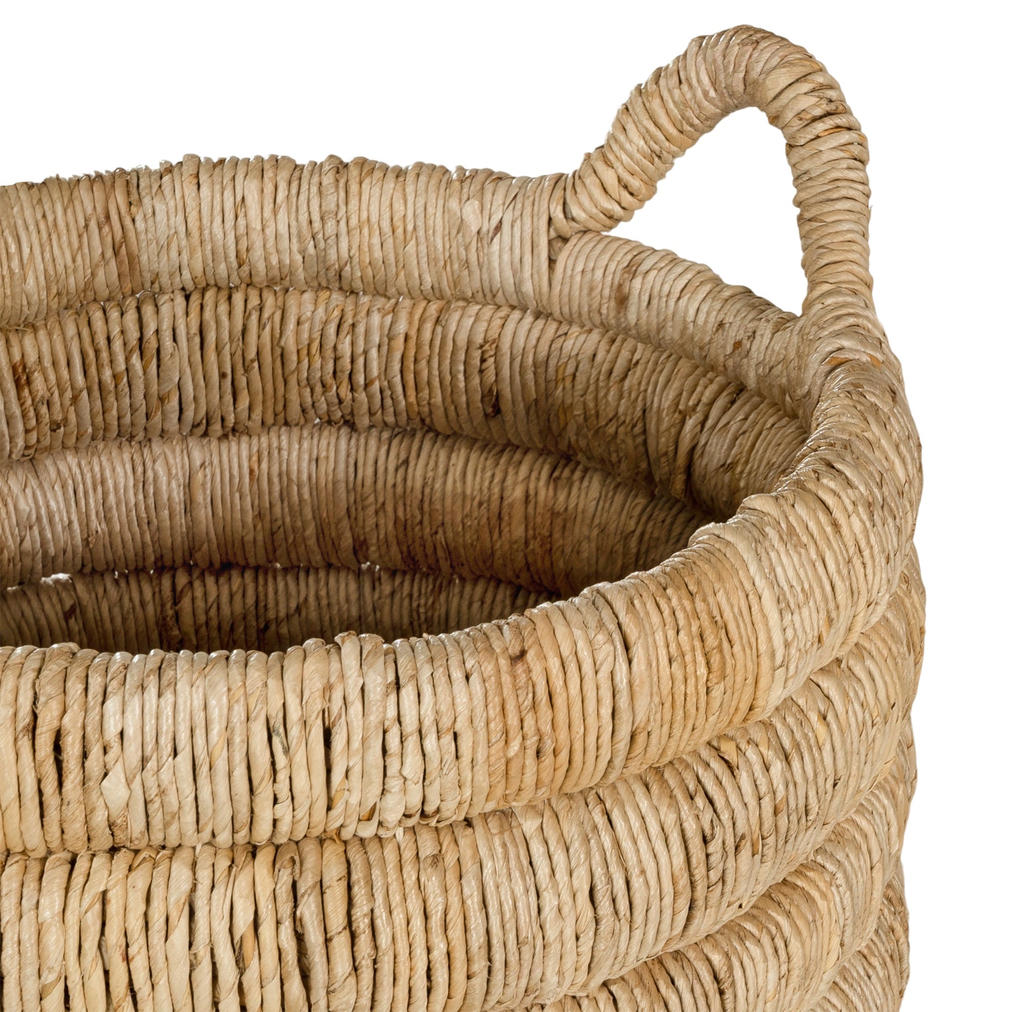 Mara natural handwoven storage basket with integrated handles in warm textured fibre set on a neutral background