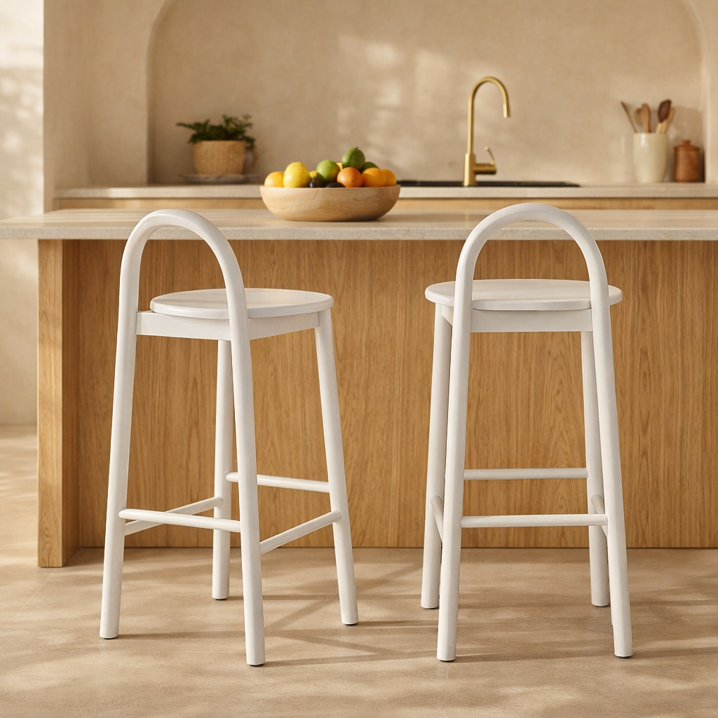 White Milo Barchair with curved silhouette styled at a timber kitchen island in a light filled modern australian home