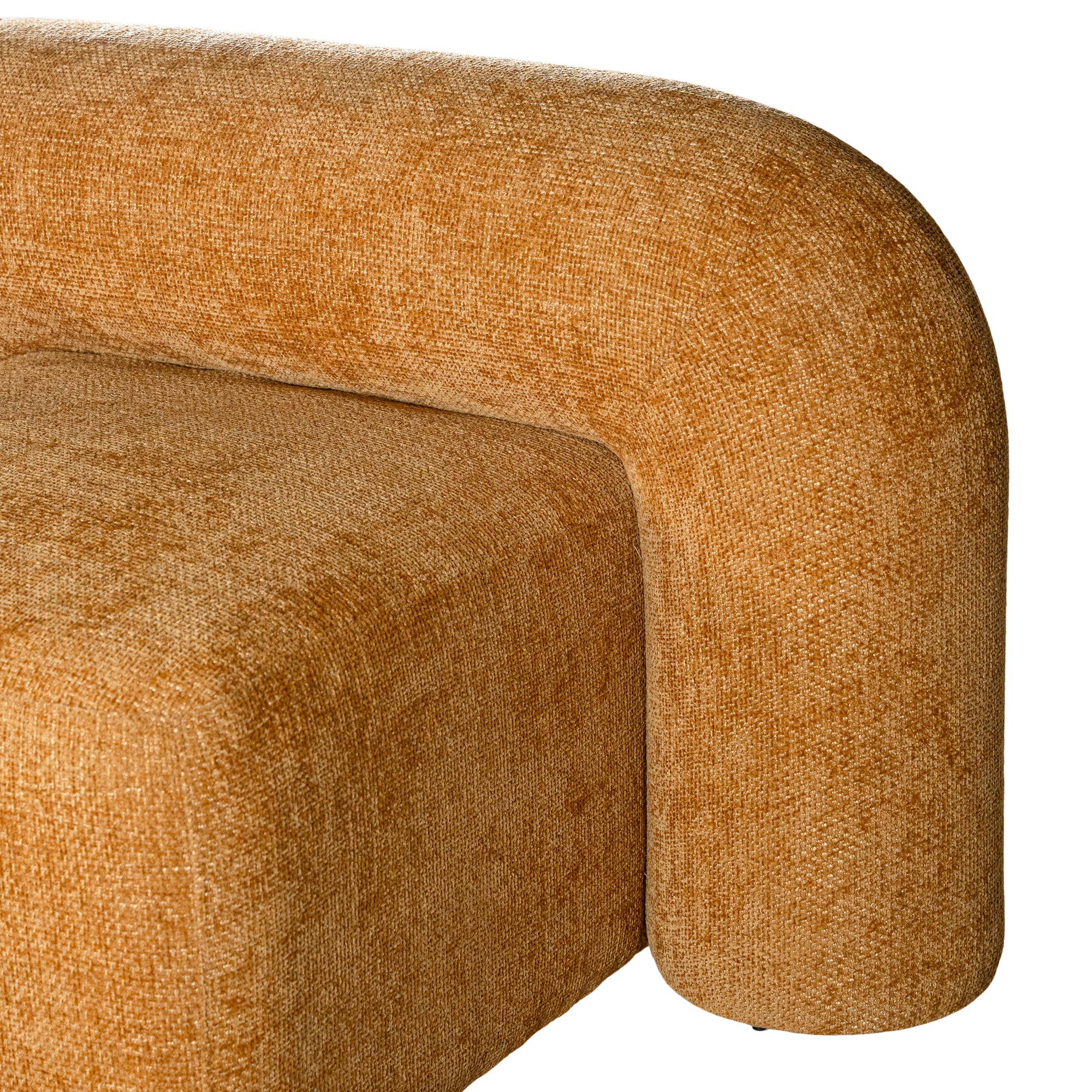 A luxurious mustard lounge chair with a sculptural, curved backrest and a matching ottoman, offering a bold yet elegant statement piece for contemporary interiors.