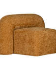 A luxurious mustard lounge chair with a sculptural, curved backrest and a matching ottoman, offering a bold yet elegant statement piece for contemporary interiors.