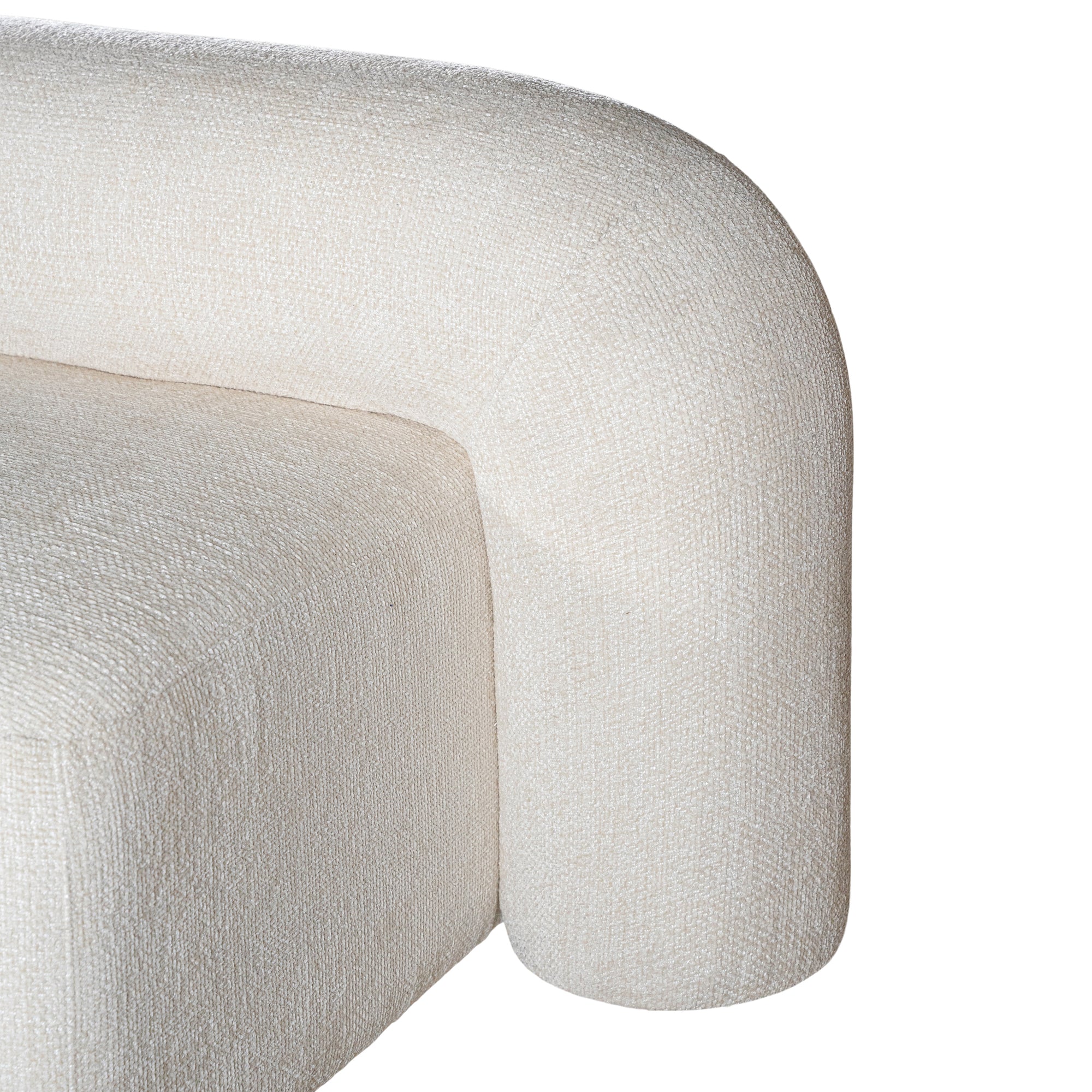 A luxurious white lounge chair with a sculptural, curved backrest and a matching ottoman, offering a bold yet elegant statement piece for contemporary interiors