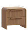 A modern oak bedside table from KULALA Living, featuring a curved silhouette and storage drawers. Crafted from natural wood, this minimalist piece enhances any bedroom with its warm, organic aesthetic