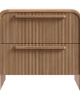 A modern oak bedside table from KULALA Living, featuring a curved silhouette and storage drawers. Crafted from natural wood, this minimalist piece enhances any bedroom with its warm, organic aesthetic