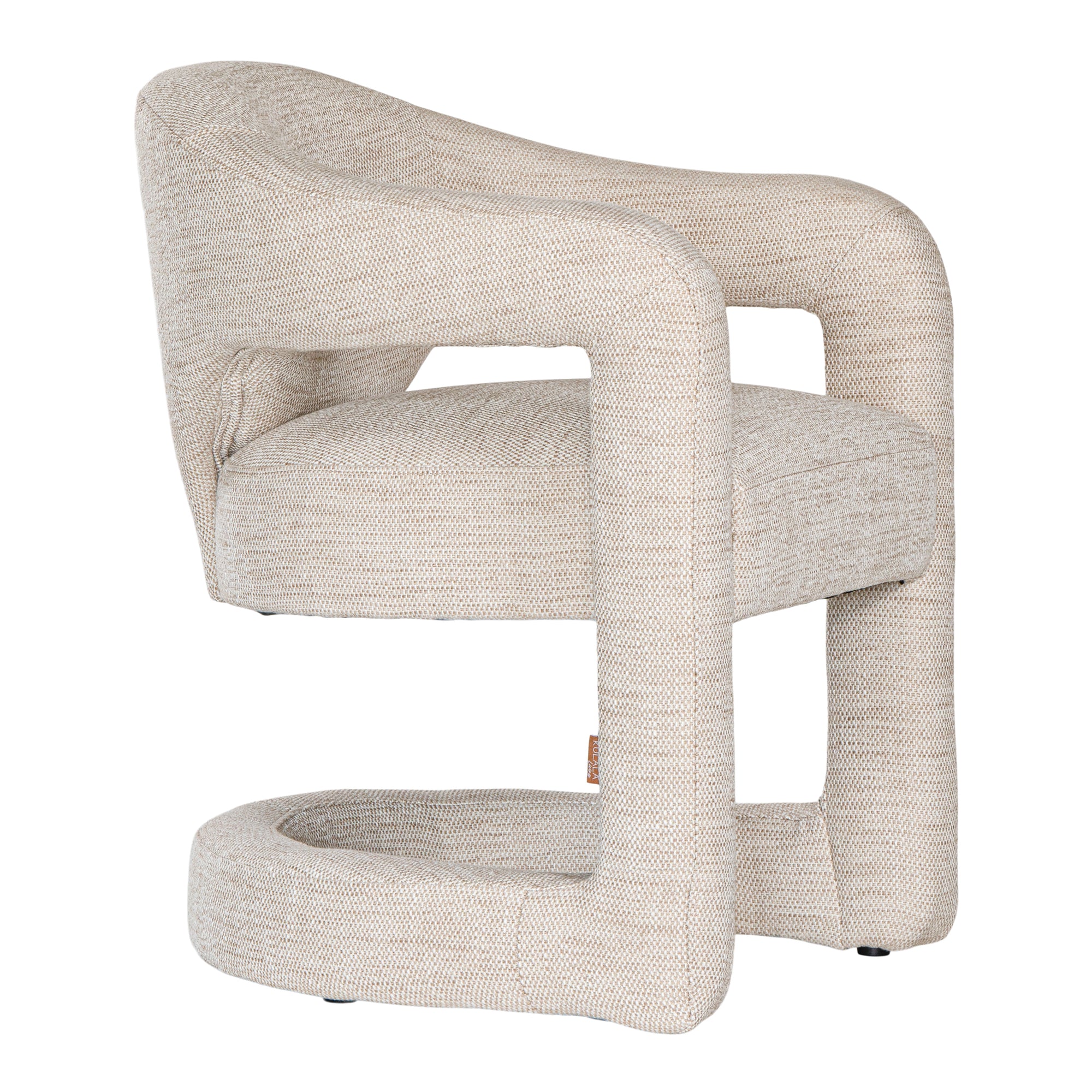 Contemporary upholstered armchair in a soft beige fabric, featuring a sculptural curved frame and plush seating for a modern, sophisticated look.